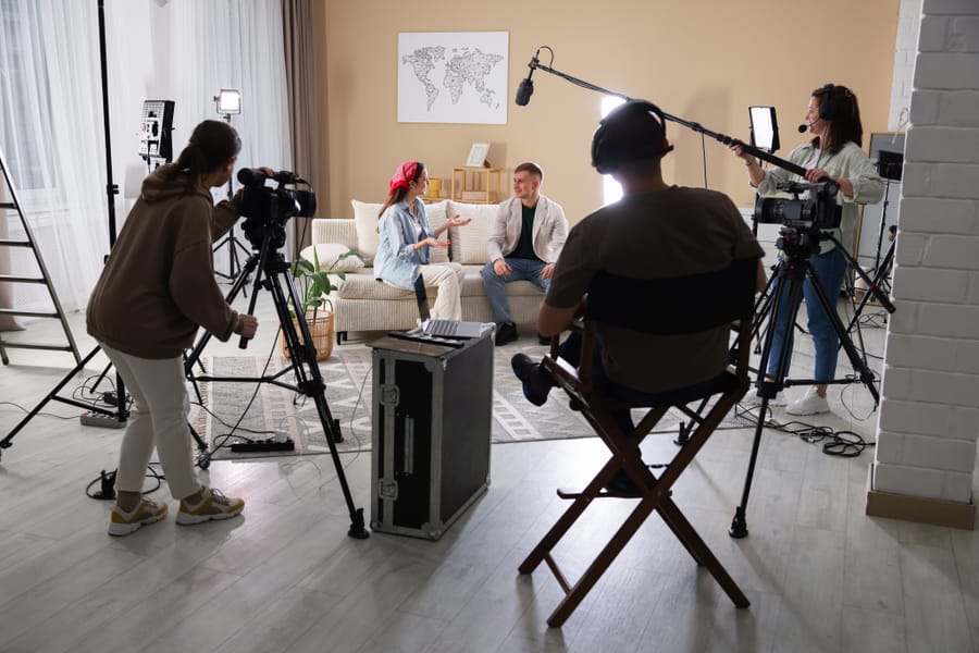 Creative team collaborating in a modern film production studio